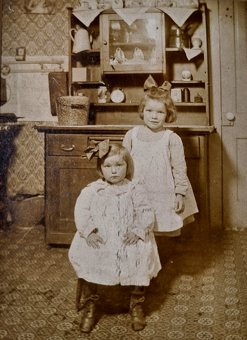 Frances (standing) Mildred (seated)  (picture of picture - not from negative)