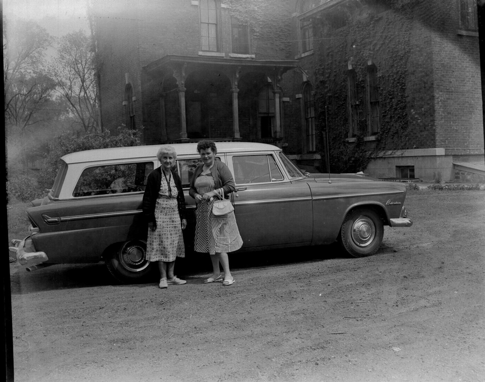 Jennie Squire Redhead, Mildred Grace Crowe Redhead, 1955 Plymouth Belvedere red and white station wagon