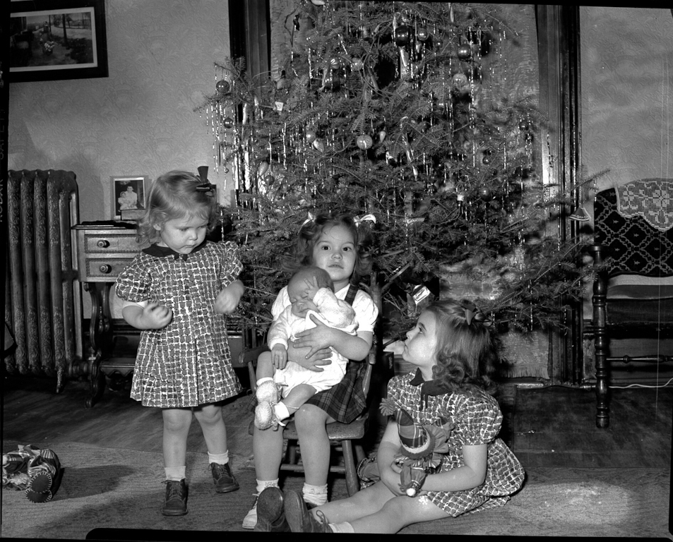 Christmas 1949 - Sally Redhead, Wesley Earl Redhead, Linda Jean Gilchrist, Kell Ann Redhead