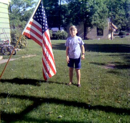 Keith Neal Gilchrist, the new flag aunt Gloria gave us.  Nice sissy bar on the bike!