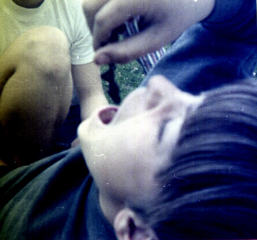 Keith Neal Gilchrist eating a toad