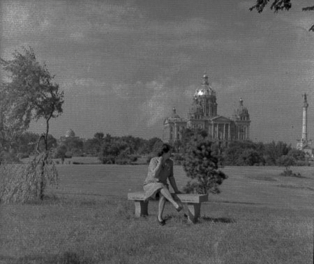 Mildred Grace Crowe Redhead posing by the Iowa State Capitol