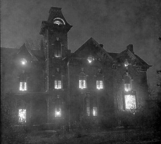Christmas time, all windows lit and music played from tower.