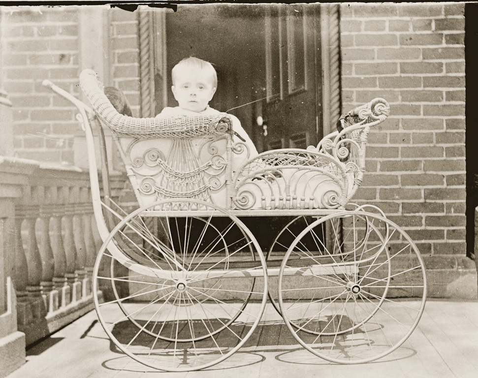 Unknown baby on porch off library