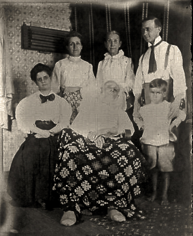 Front: Jessie (Henry's daughter / Jennie Squire Redhead's cousin), Uncle Henry, Herbert Henry Redhead  Back: unknown, Auntie Rebecca Burgess, Uncle Horace